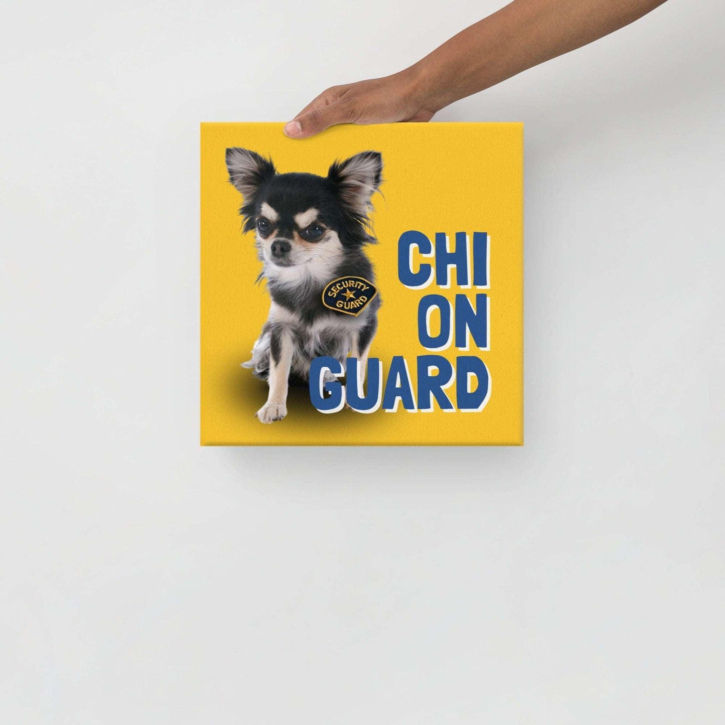 CHI ON GUARD - one of the famous Chimigos chihuahua memes. This is a vivid and fade resistant art print on a stretched canvas. A handsome longhaired chihuahua wears an official security badge and you better watch out because they are on guard. Looks can be deceiving. Beware of the chi! A funny and stylish gift idea for someone whose house is guarded by a cute but bossy little chi. Perfect for the new chihuahua parent or as a housewarming gift! Bright colours - yellow and blue.