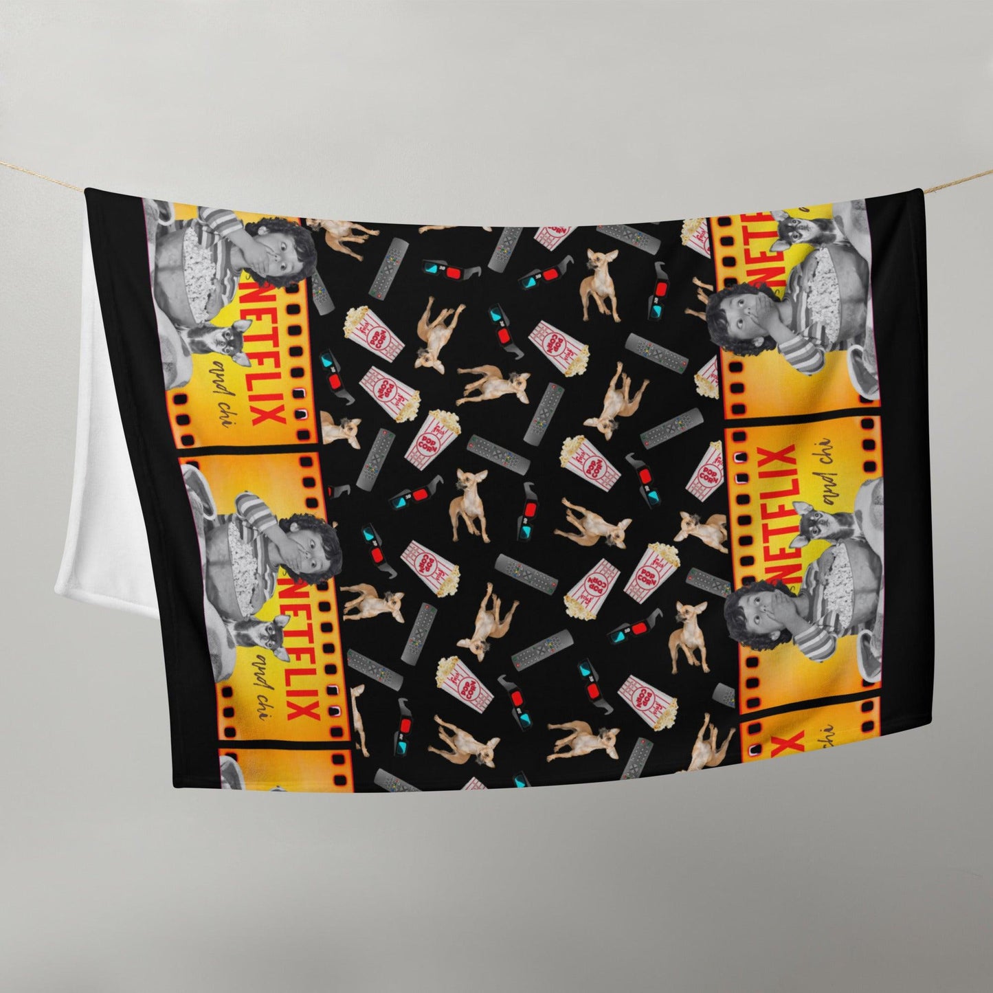 What's better than a Saturday night at home doing Netflix and Chill? Netflix and CHI! If your best Netflix and Chill sofa buddy is a little chihuahua, then this fun Netflix and Chi throw blanket is meant for you. Or a brilliant gift for chihuahua parents. This cosy and silky blanket features two "film reels" with a boy and his chihuahua pal watching a scary movie together, and the words "Netflix and Chi". The black background is scattered with popcorn, chihuahuas, 3D glasses and TV remotes.