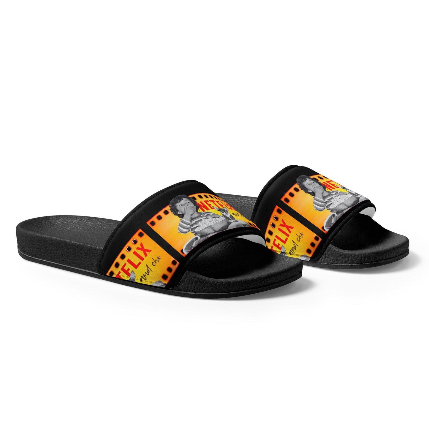 What's better than Netflix and Chill? Netflix and CHI! If your Netflix and Chill sofa buddy is a chihuahua, these cool Netflix and Chi women's slides are for you. Or a brilliant gift for a chihuahua mum. The faux leather straps feature a boy and his chihuahua pal watching a scary movie together, and the words "Netflix and Chi" against a black background. Let your weary feet chill too in the cushioned upper straps and the contoured, textured foot beds. Design by Renate Kriegler for Chimigos.