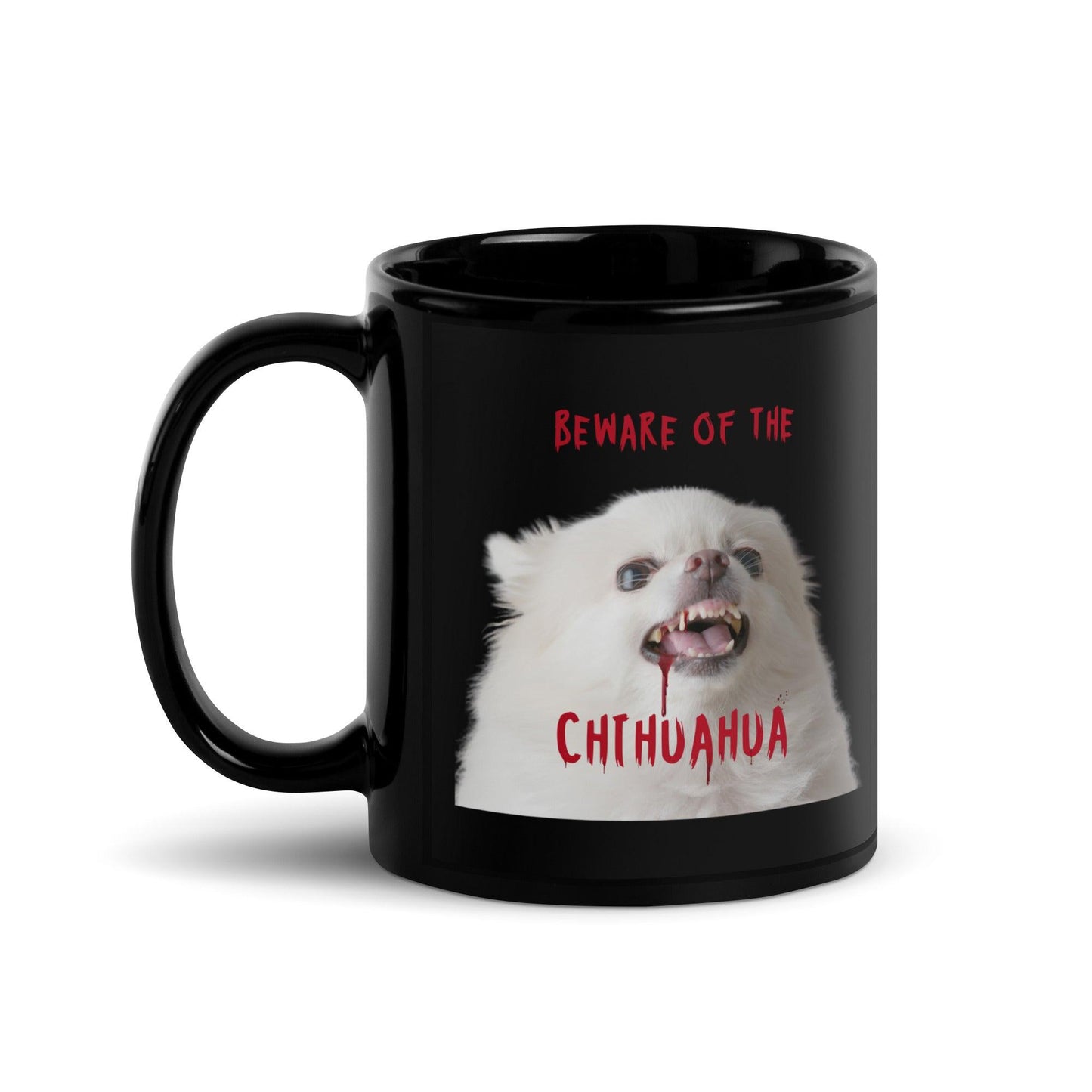 An angelic fluffy white chihuahua with bloody fangs reminds us that looks can be deceiving. BEWARE OF THE CHIHUAHUA!  This glossy black zombie chihuahua mug makes a punky gift for any Halloween enthusiast. Design by Renate Kriegler for Chimigos.