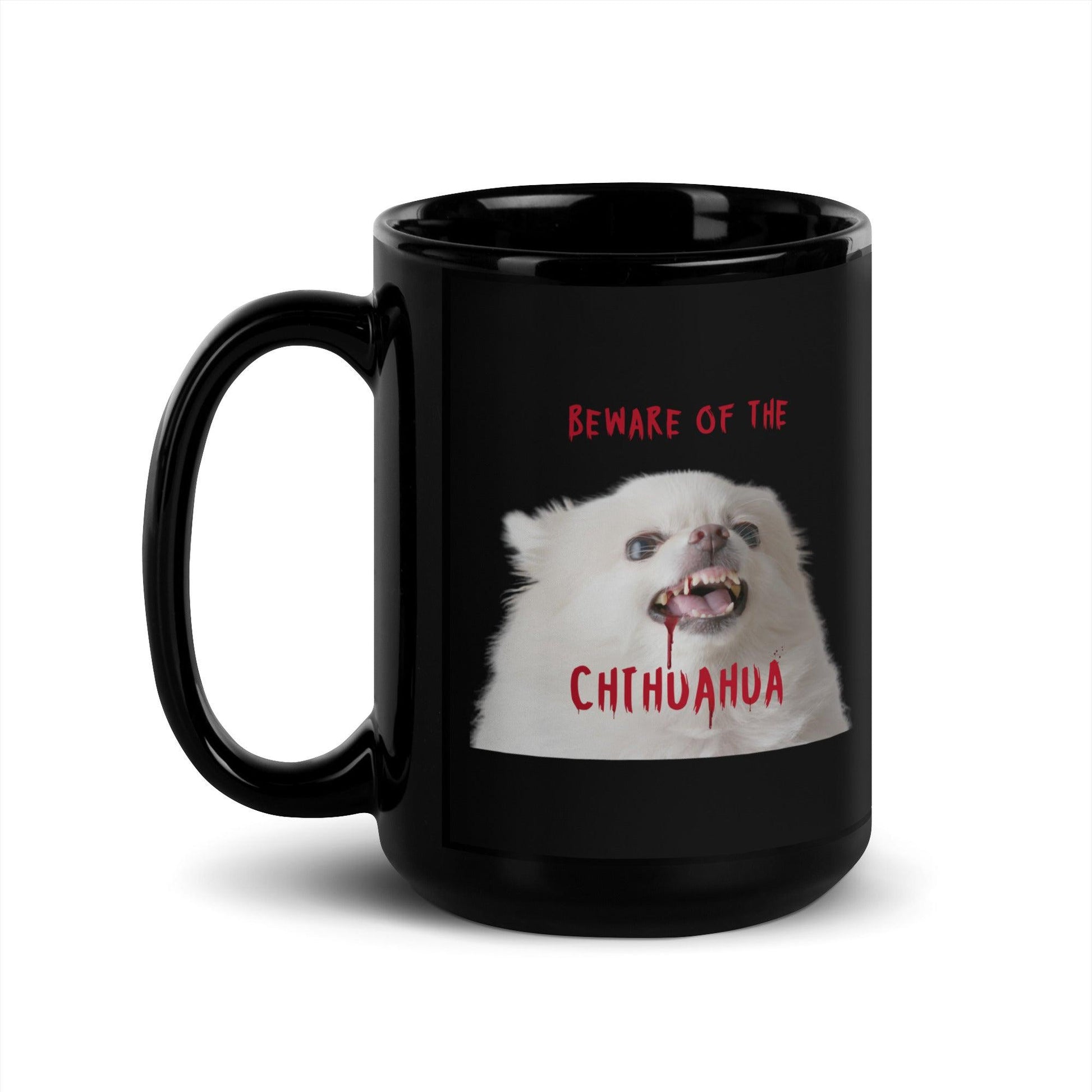 An angelic fluffy white chihuahua with bloody fangs reminds us that looks can be deceiving. BEWARE OF THE CHIHUAHUA!  This glossy black zombie chihuahua mug makes a punky gift for any Halloween enthusiast. Design by Renate Kriegler for Chimigos.
