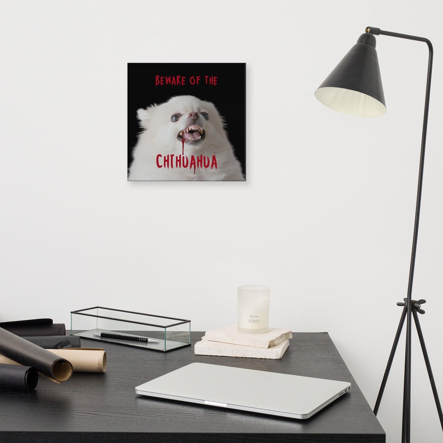 BEWARE OF THE CHIHUAHUA - one of the famous Chimigos chihuahua memes. This is a vivid and fade resistant art print on a stretched canvas. An angelic fluffy white chihuahua with bloody fangs reminds us that looks can be deceiving. Beware of the chihuahua! A punky gift idea for someone whose house is guarded by a cute but vicious little chi. Perfect for the new chihuahua parent, as a housewarming gift, or maybe for Halloween!