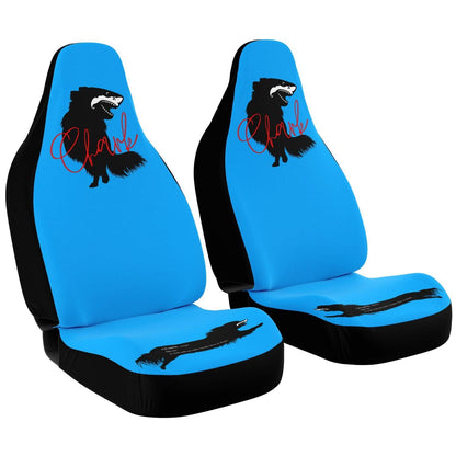This punky pair of electric blue front car seat covers feature the silhouette of a black longhair chihuahua with the face of a great white shark - mouth open to show off jaws lined with sharp teeth. The word "Chark" is artfully placed in red cursive font over the image. The seat fronts feature another shark-faced chihuahua, and a "dictionary entry" of the noun "chark": a chihuahua with teeth like a shark. Design by Renate Kriegler for Chimigos.