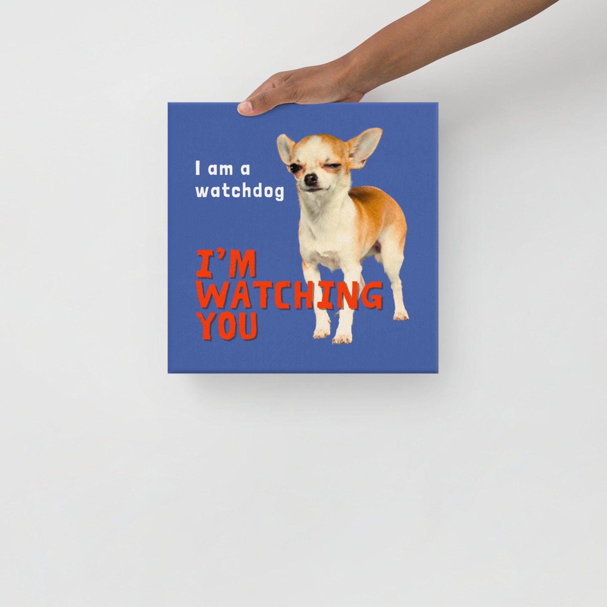 I am a watchdog; I'M WATCHING YOU - one of the famous Chimigos chihuahua memes.  This is a vivid and fade resistant art print on a stretched canvas. A cheeky gold, fawn and white shorthair chihuahua winks as they inform visitors that they will be watching their every move. A funny and stylish gift idea for someone whose house is presided over by a feisty and alert little chi. Perfect for the new chihuahua parent or as a housewarming gift!