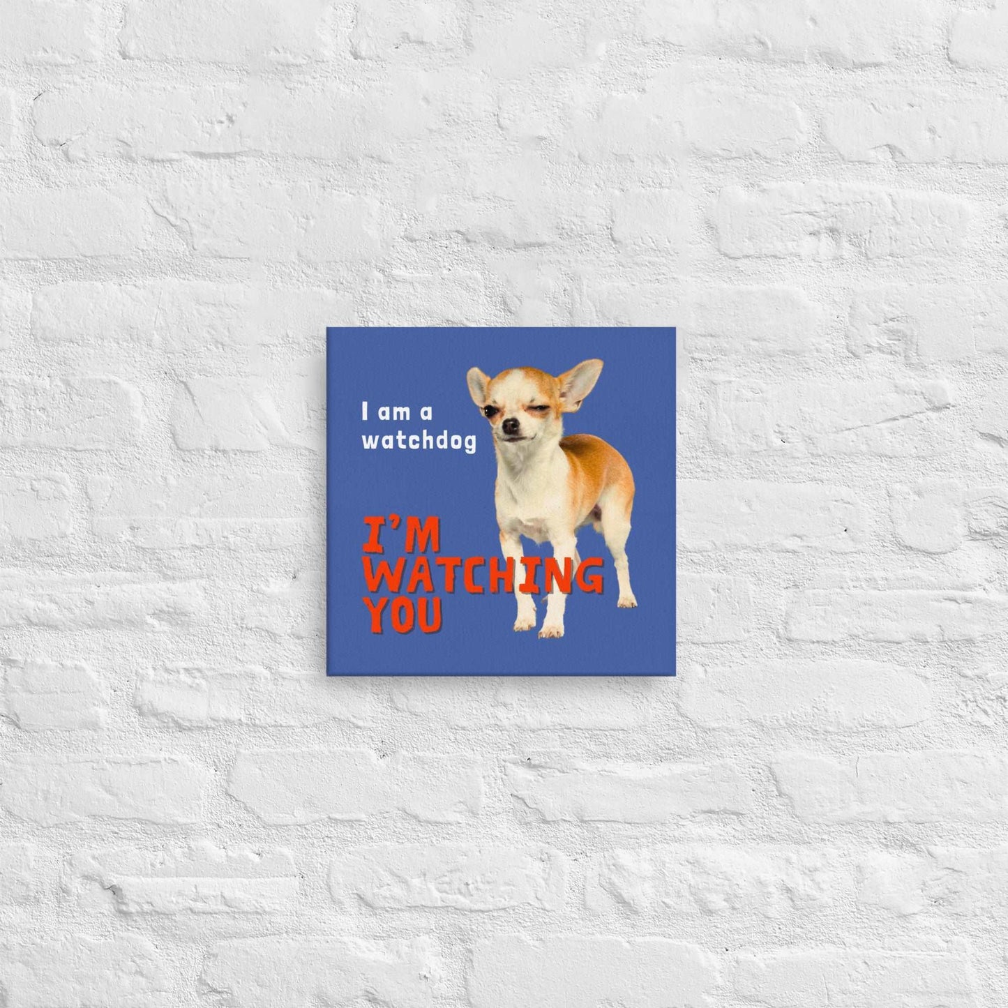I am a watchdog; I'M WATCHING YOU - one of the famous Chimigos chihuahua memes.  This is a vivid and fade resistant art print on a stretched canvas. A cheeky gold, fawn and white shorthair chihuahua winks as they inform visitors that they will be watching their every move. A funny and stylish gift idea for someone whose house is presided over by a feisty and alert little chi. Perfect for the new chihuahua parent or as a housewarming gift!