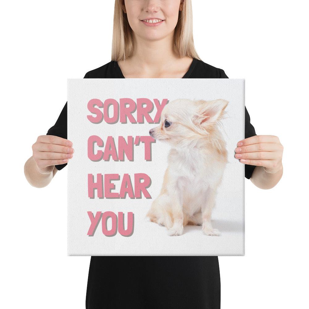 SORRY CAN'T HEAR YOU - one of the famous Chimigos chihuahua memes. This is a vivid and fade resistant art print on a stretched canvas. A cute and fluffy fawn and white chihuahua turns their head away to pretend they can't hear us. Typical. Those big ears are mere ornaments! A funny and stylish gift idea for someone who loves a cheeky chihuahua.