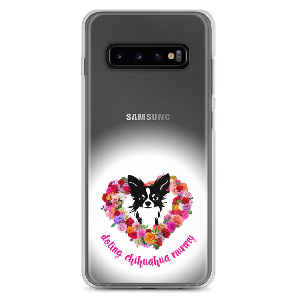 There's something so special about the bond between a girl and her chi baby. These cute little dogs charm their way deep into their mum's heart. Quality iPhone® case with solid back, flexible sides and precisely aligned port openings. The design features a black and white longhaired chihuahua surrounded by a lush heart-shaped rose garland, and the words "doting chihuahua mummy" - an adorable Mother's Day / birthday / Christmas gift for a doting chihuahua mummy. Design by Renate Kriegler for Chimigos.