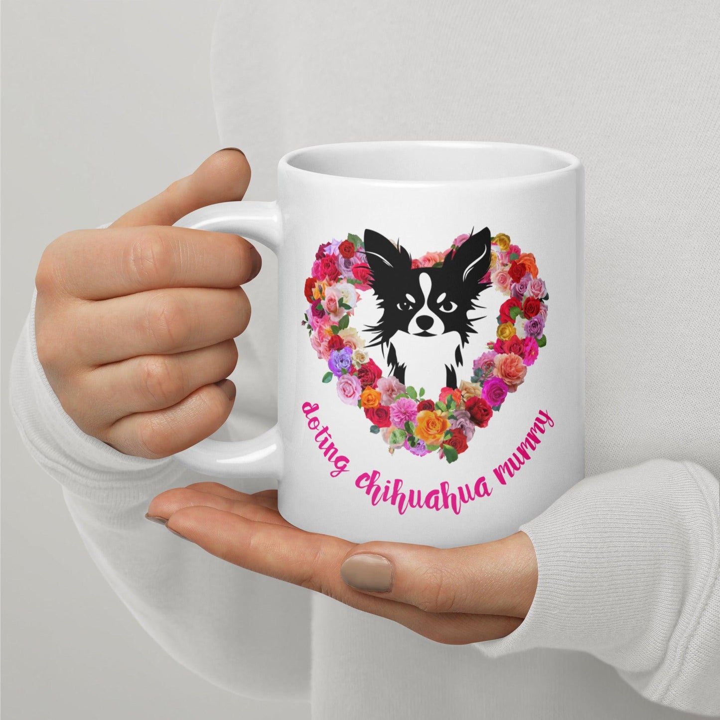 Doting Chihuahua Mummy mug. Available in three sizes. There's something so special about the bond between a girl and her chi baby. These cute little dogs charm their way deep into their mum's heart. This adorable chihuahua and roses mug makes a divine Mother's Day / birthday / Christmas gift for a doting chihuahua mummy. "Aw" guaranteed! Design by Renate Kriegler for Chimigos.
