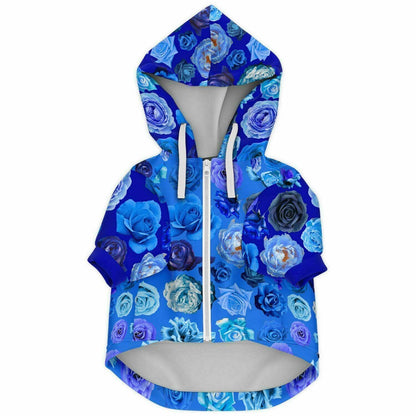  Blue roses "I love my mummy" hoodie for chihuahua boys. This zip-up dog hoodie covered in blue roses sports a handy velcro pouch pocket on the back featuring a chihuahua surrounded by a love heart of roses and the words "I love my Mummy". Complete with on-trend flat drawstring. So cute! The inside is brushed fleece to keep your chi cosy on walkies, or on cold winter nights cuddling on the sofa. Perfect Mother's Day gift for a chihuahua mum. Design by Renate Kriegler for Chimigos.