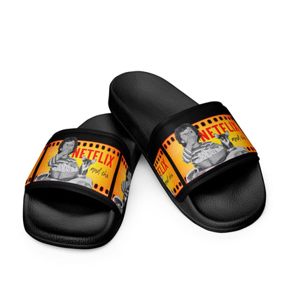 What's better than Netflix and Chill? Netflix and CHI! If your Netflix and Chill sofa buddy is a chihuahua, these cool Netflix and Chi men's slides are for you. Or a brilliant gift for a chihuahua dad. The faux leather straps feature a boy and his chihuahua pal watching a scary movie together, and the words "Netflix and Chi" against a black background. Let your weary feet chill too in the cushioned upper straps and the contoured, textured foot beds. Design by Renate Kriegler for Chimigos.