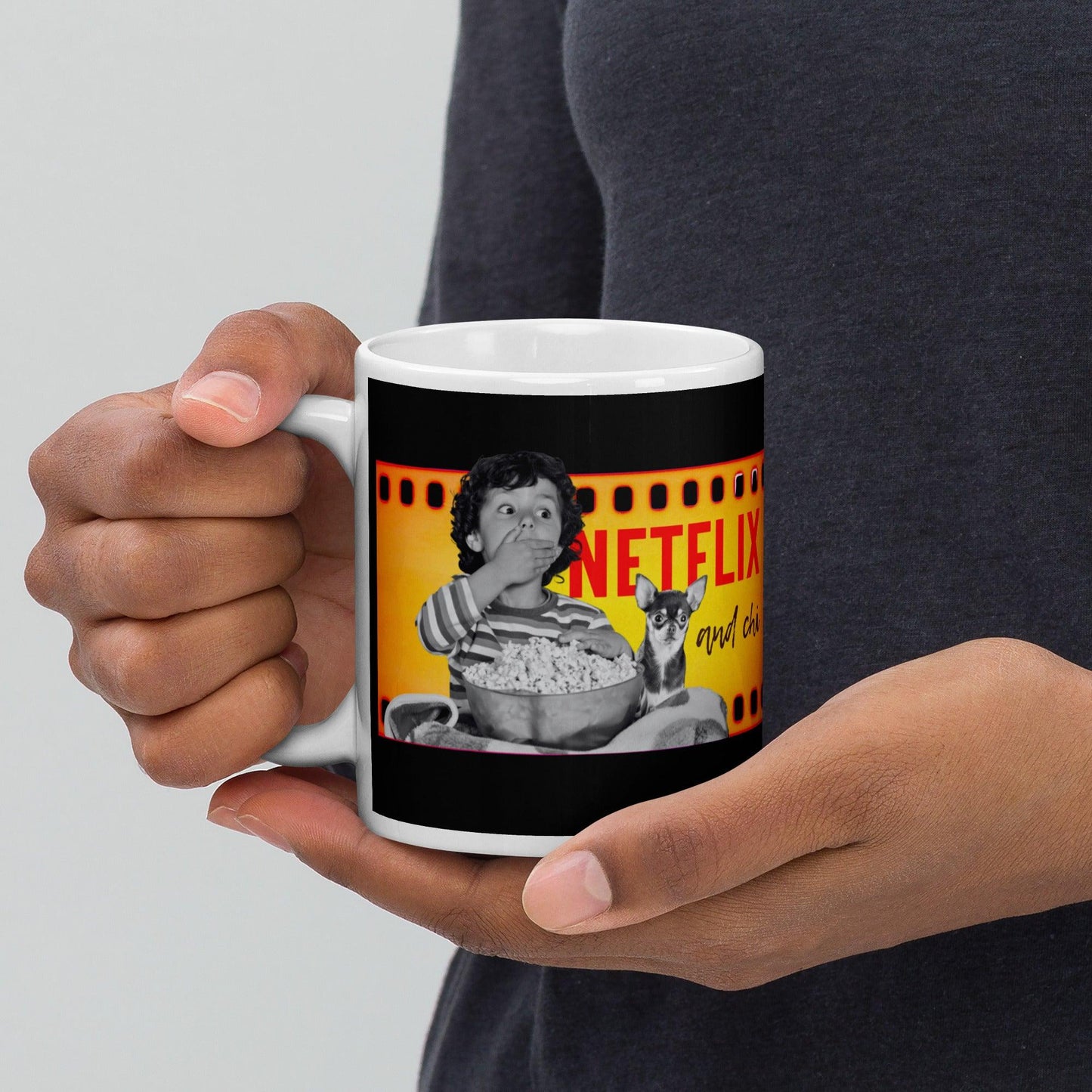 If your best Netflix and Chill sofa buddy is a little chihuahua, then this adorable Netflix and Chi mug is meant for you. Or a brilliant gift for friends and family who are chihuahua parents. This classic mug featuring a boy and his chihuahua pal watching a scary movie together, with the words "Netflix and Chi", comes in three sizes. Choose the size you like best, or invest in a selection for the benefit of your movie night guests. Design by Renate Kriegler for Chimigos.